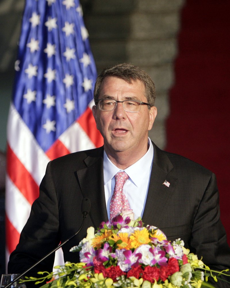 U.S. Defense Secretary Ash Carter speaks to reporters at a joint press conference with his Vietnamese counterpart Gen. Phung Quang Thanh in Hanoi, Vietnam Monday, June 1, 2015. Carter is on a three-day visit to Vietnam to deepen military cooperation between the two former foes. 