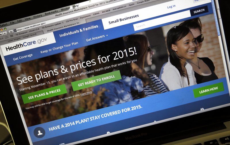 In this Nov. 12, 2014 file photo, the HealthCare.gov website, where people can buy health insurance, on a laptop screen, is seen in Portland, Ore. 