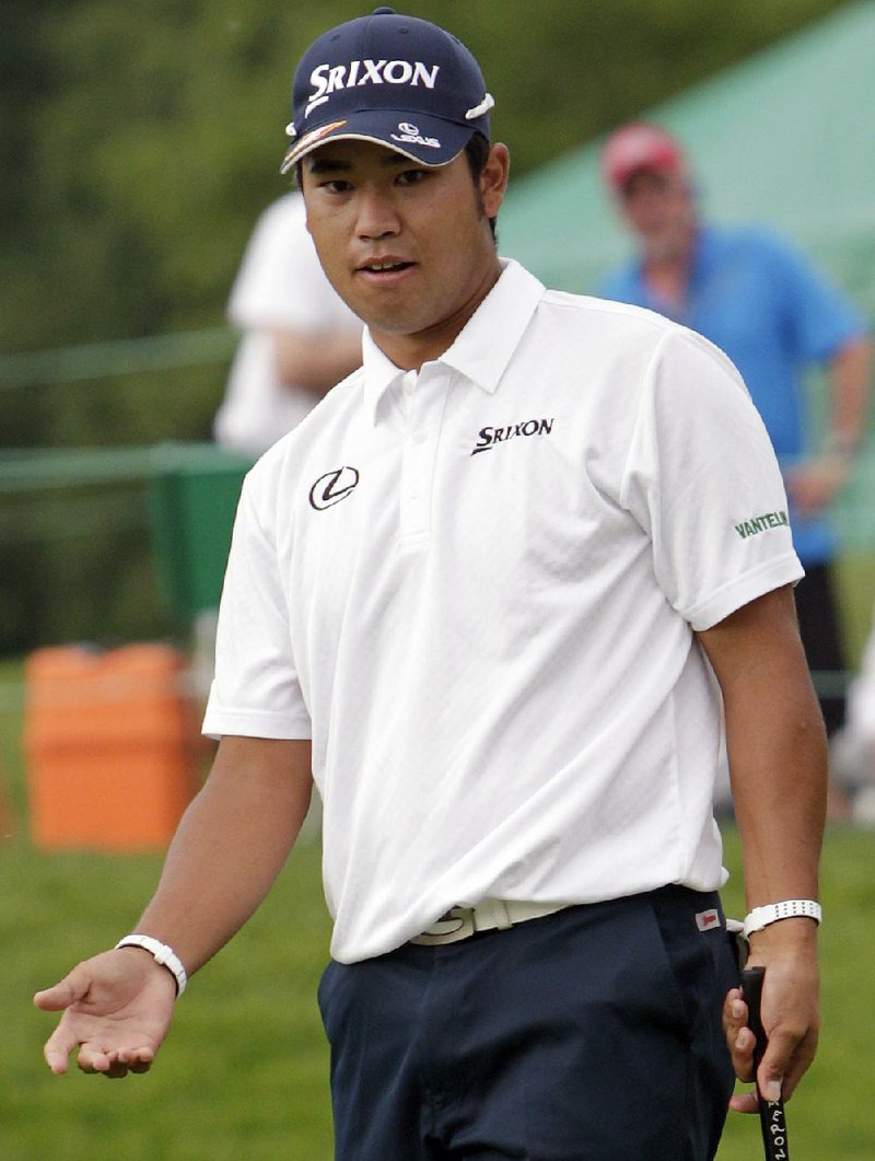 Hideki Matsuyama, of Japan, reacts to missing his birdie putt on the 18th hole during the first round of the Memorial golf tournament, Thursday, June 4, 2015, in Dublin, Ohio. 
