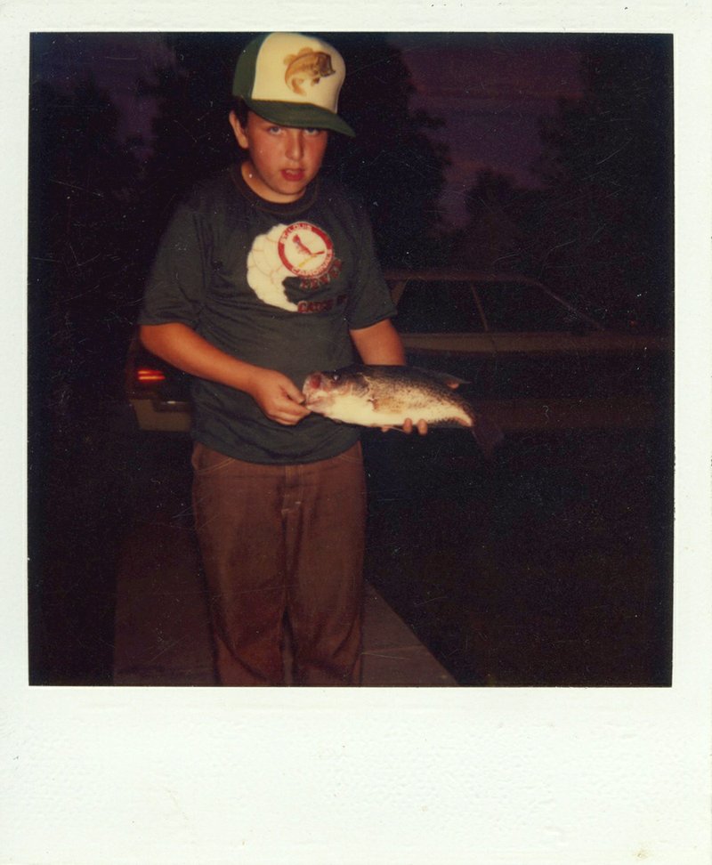 A much younger version of writer James K. Joslin is pictured here with a crappie in a Polaroid picture snapped by his mother.