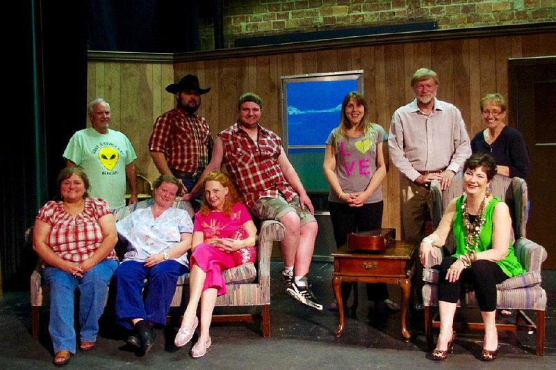 A cast of nine (with director Mary Bishop, upper right) will give the Jones-Hope-Wooten comedy Doublewide, Texas, its world premiere Saturday at the Lyric Theatre in Harrison.

