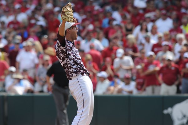 Missouri State starter Matt Hall reacts Saturday, June 6, 2015, to the final out of the Bears' 3-1 win over Arkansas in the Super Regional at Baum Stadium in Fayetteville. Hall pitched a complete game in the win.
