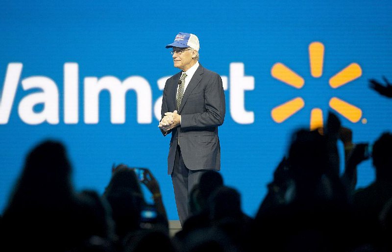 Rob Walton, son of Wal-Mart founder Sam Walton, wore one of his father’s hats during Friday’s announcement in Fayetteville.