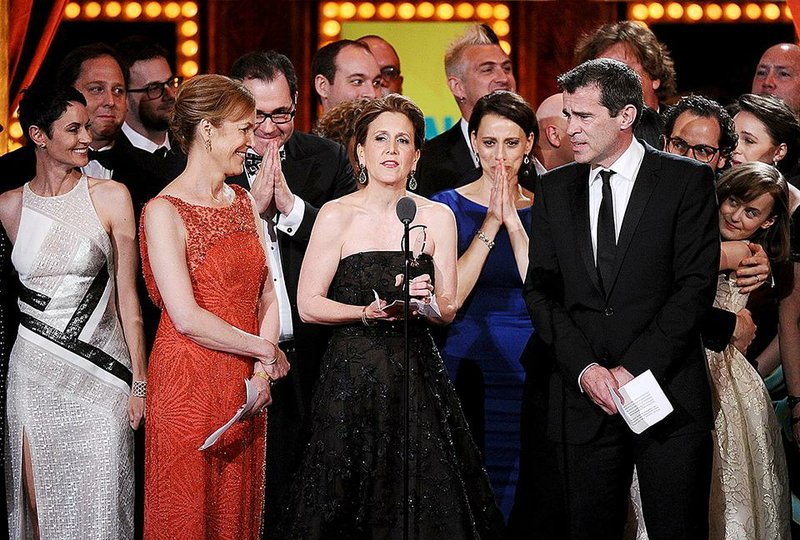 Kristin Caskey (center), along with cast and crew, accepts the award on Sunday for best musical for Fun Home at the 69th annual Tony Awards at Radio City Music Hall in New York.