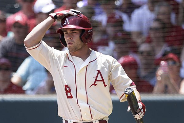 Arkansas outfielder Tyler Spoon walks to the plate during the 1st inning in a super regional game of the NCAA college baseball tournament against Missouri State in Fayetteville, Ark., Sunday, June 7, 2015. Arkansas defeated Missouri State 3-2. (AP Photo/Danny Johnston)