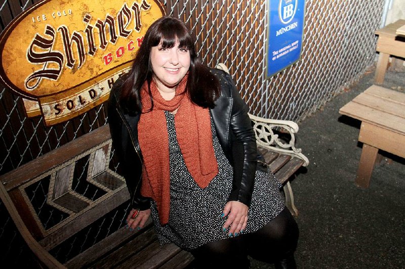 Actress Ashlie Atkinson lounges in the courtyard at South, one of her favorite Brooklyn pubs. 