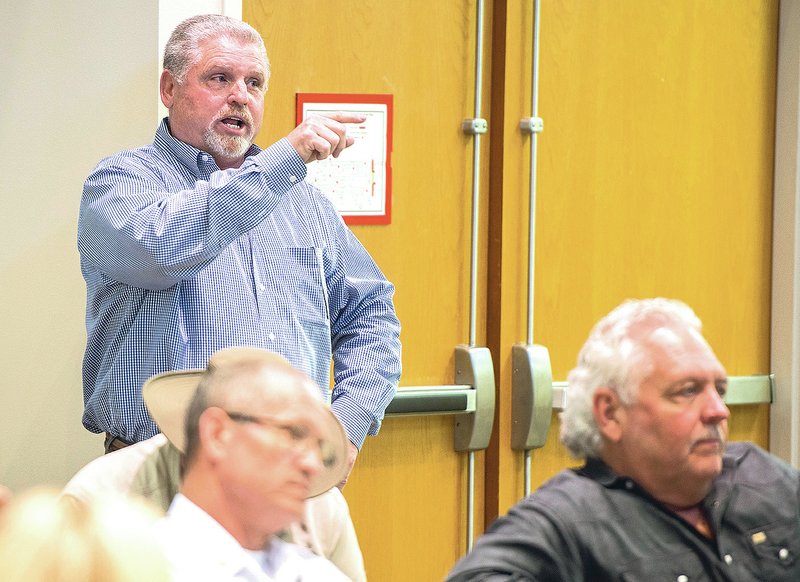 Ray Dotson speaks Monday at the Springdale Civil Service Commission in the City Council meeting room in Springdale. The commission met to consider his complaint against Chief Kathy O’Kelley of the Police Department for releasing a police report concerning the Duggar family.