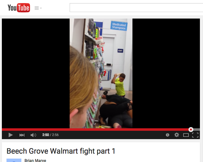 This screenshot from a YouTube video shows part of a fight between two women in an Indiana Wal-Mart. Watch the full video below.