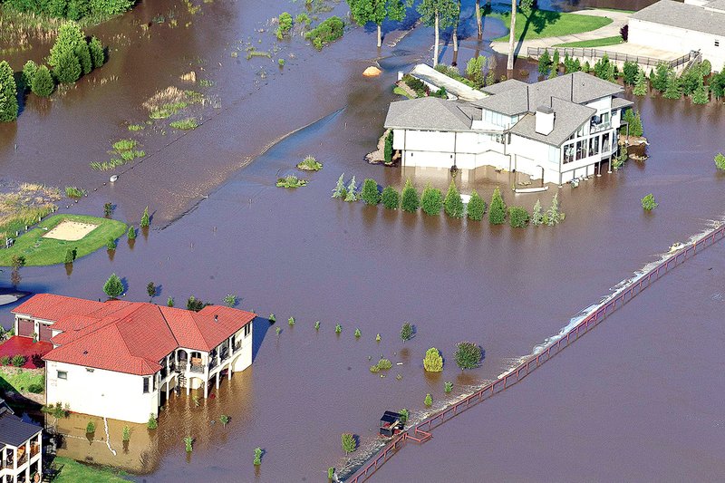 Arkansas communities endure flooding, evacuations