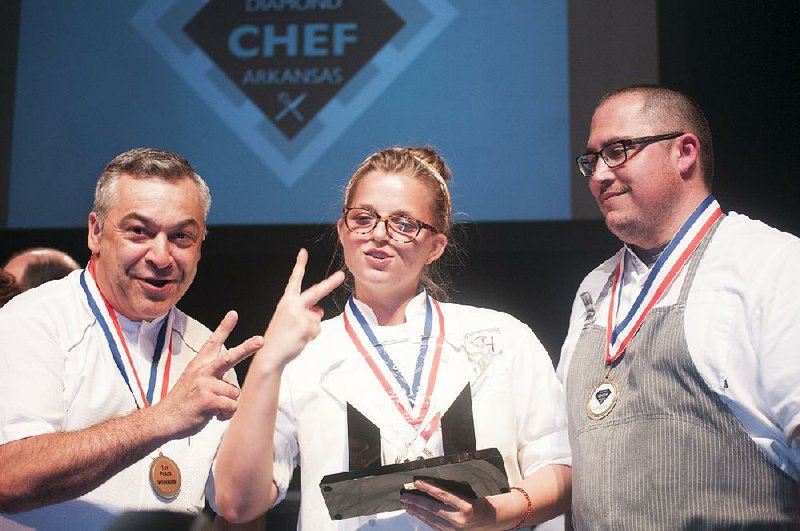 Diamond Chef winner Marc Guizol (left) and his Capital Hotel sous chefs Adrienne Rogers and Arturo Solis playfully show it’s the second straight time they’ve won the competition.
