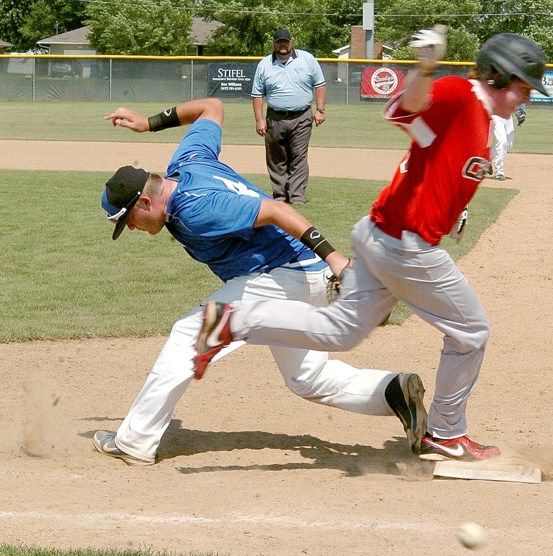 McDonald County&#8217;s Seth Shockley collides with Clever first baseman Gunner Curtis during McDonald County&#8217;s 6-5 win Sunday in the Carl Junction tournament.