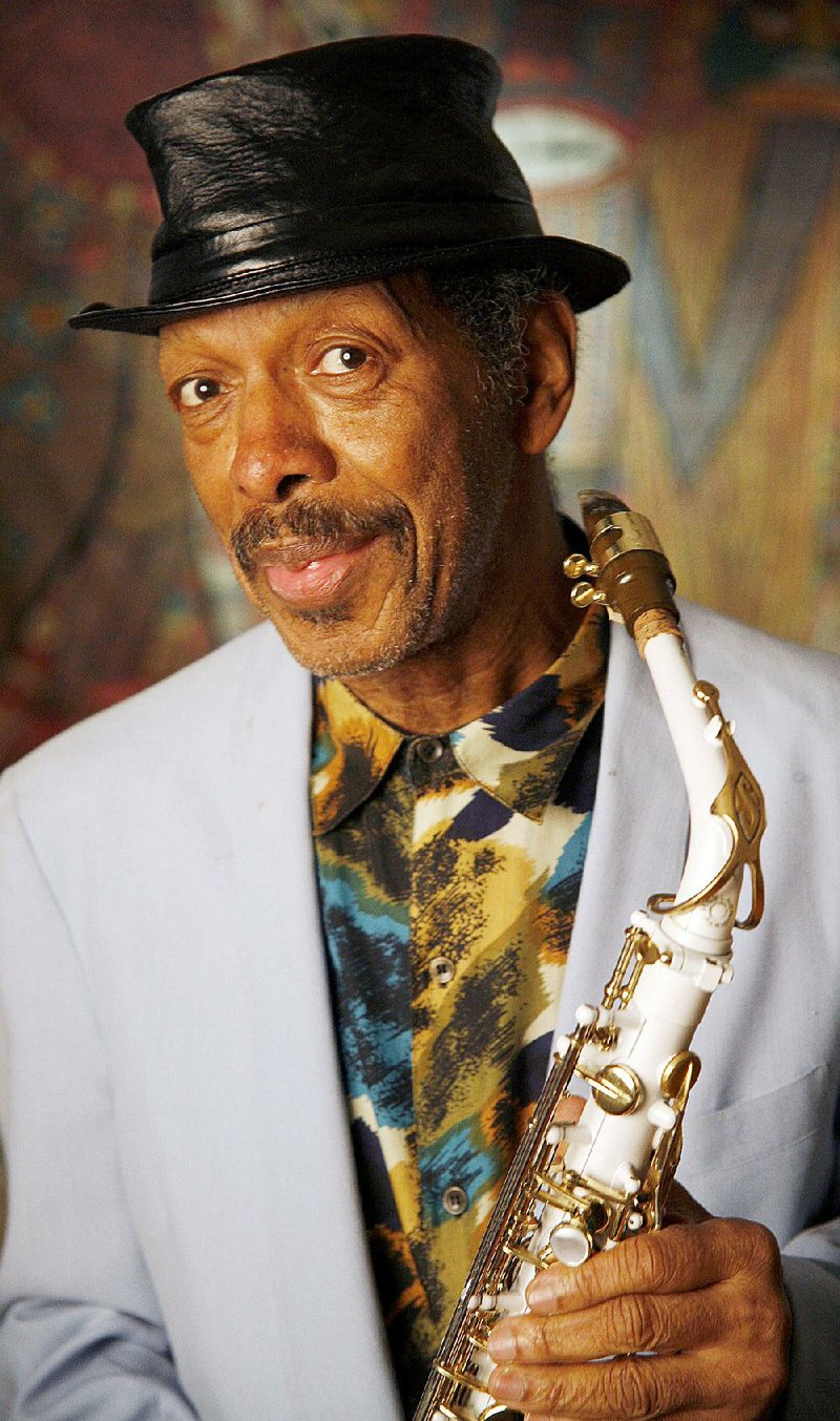 In this April 16, 2007, file photo, Pulitzer Prize-winning jazz artist Ornette Coleman poses in his New York apartment. Coleman, the visionary saxophonist who pioneered "free jazz" and won a Pulitzer Prize in 2007,  died, on Thursday, June 11, 2015 in New York. 