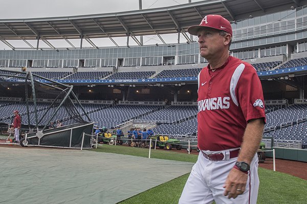 Arkansas coach Dave Van Horn watches practice Friday, June 12, 2015, at TD Ameritrade Park in Omaha, Neb. 