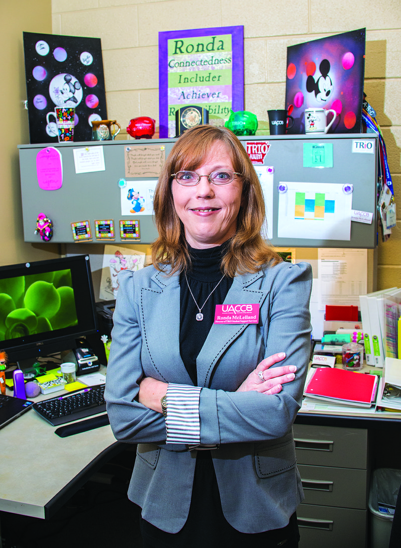 Ronda McLelland, the new director of TRIO Student Support Services at the University of Arkansas Community College at Batesville, stands in her office with the Mickey Mouse decorations made by her students because of her love of all things Disney.