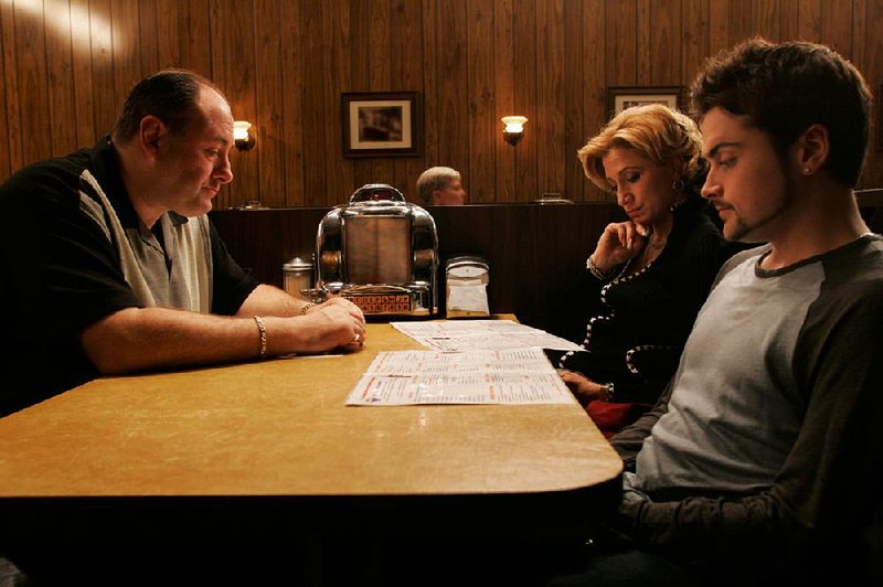 Tony Soprano (James Gandolfini, from left), Carmela Soprano (Edie Falco) and their son A.J. (Robert Iler) in the final scene of The Sopranos.
