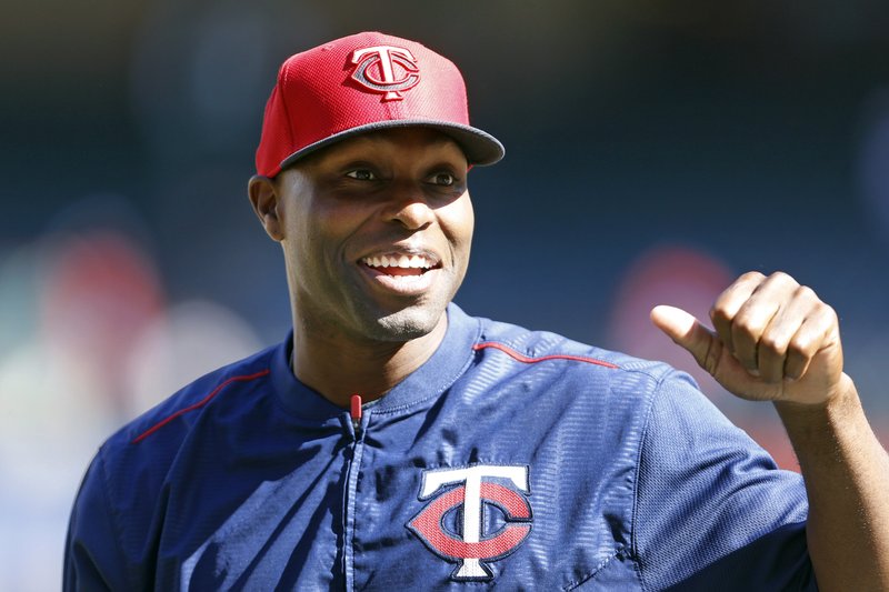 Minnesota Twins' Torii Hunter takes the field for batting practice before playing the Texas Rangers, Friday, June 12, 2015, in Arlington, Texas.