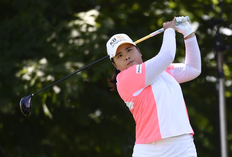 Inbee Park of South Korea tees off at the second hole during the third round of the KPMG Women's PGA golf championship at Westchester Country Club on Saturday, June 13, 2015, in Harrison, N.Y. 