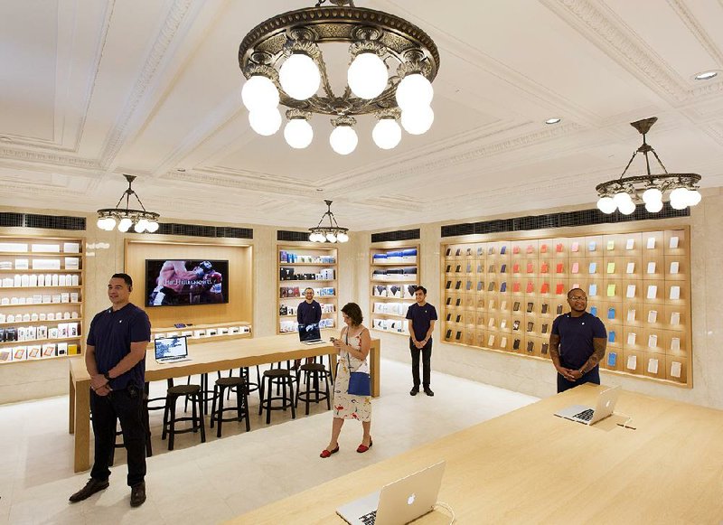 The accessories room is decorated with reproduction chandeliers at Apple’s new store on New York’s Upper East Side. 