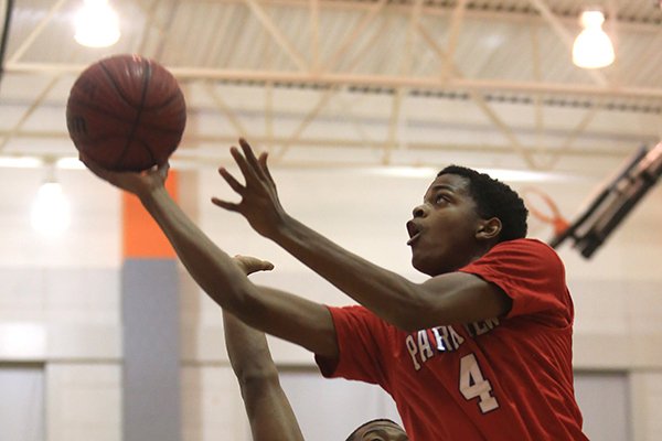 Little Rock Parkview guard Daryl Macon attempts a shot Tuesday, Jan. 28, 2014, at Hall High School in Little Rock. 