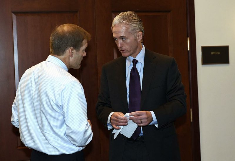 Rep. Trey Gowdy, R-S.C. (right), chairman of the House panel investigating Benghazi, talks with Rep. Jim Jordan, R-Ohio, before a private session with Sidney Blumenthal. 