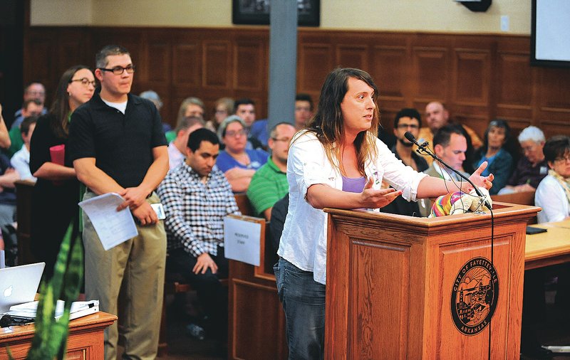 NWA Democrat-Gazette/ANDY SHUPE Justine Turnage of Fayetteville speaks Tuesday about a new anti-discrimination proposal during a meeting of Fayetteville&#8217;s City Council at the city administration building. Turnage described her living and employment experiences as a transgendered person in Fayetteville. Visit nwadg.com for updated information about the meeting.