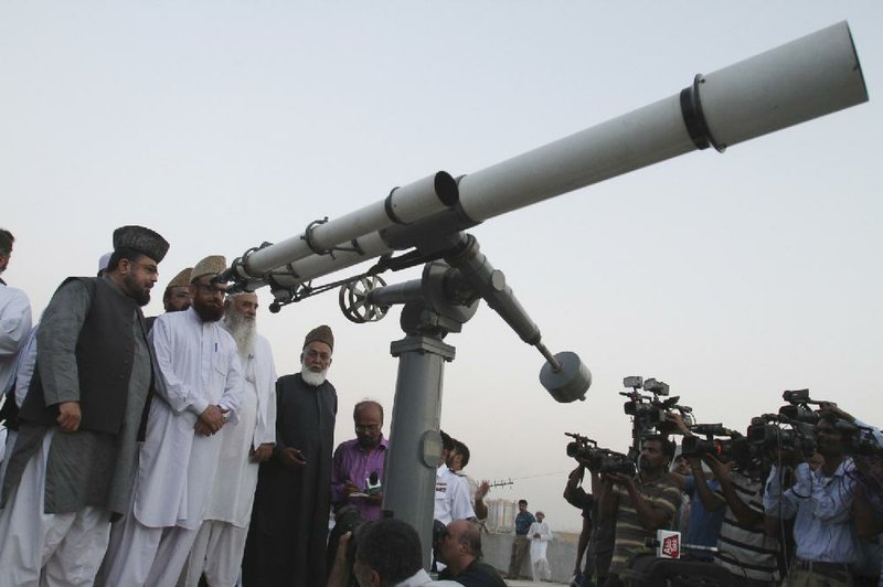 Pakistani clerics gather Wednesday in Karachi to await the sighting of the new moon signaling the start of Ramadan.