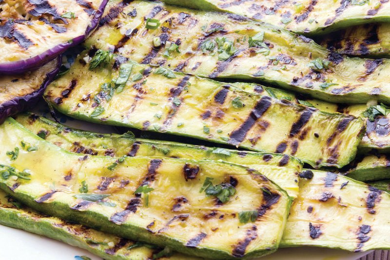 Slice the zucchini and eggplant lengthwise before putting them on the grill.