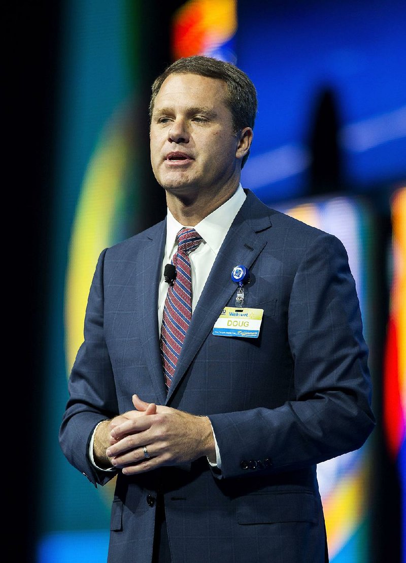 Doug McMillon, Wal-Mart Stores Inc.’s chief executive officer, speaks on stage during the annual Wal-Mart shareholders meeting June 5 at Bud Walton Arena in Fayetteville. 
