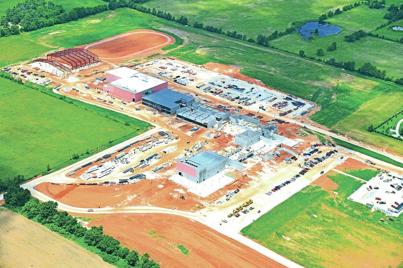 The campus of the Bentonville School District’s West High School in Centerton is seen in this aerial view in late May. The school is scheduled to open in August 2016. It was a year ago this week the district held a groundbreaking ceremony for its second high school on what was an empty pasture at the time.