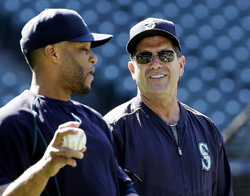 Former Seattle Mariners designated hitter Edgar Martinez (right) takes over as the team’s new hitting coach after Howard Johnson was reassigned to the minor-league system. Martinez takes over a team that has a league-worst .233 batting average and ranks 28th in runs scored.