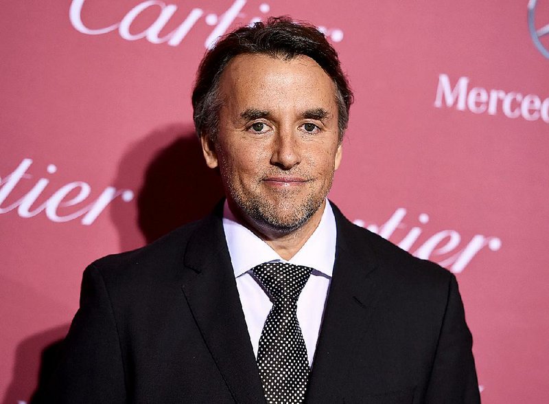 In this Saturday, Jan. 3, 2015 file photo, Richard Linklater arrives at the 26th annual Palm Springs International Film Festival Awards Gala in Palm Springs, Calif.