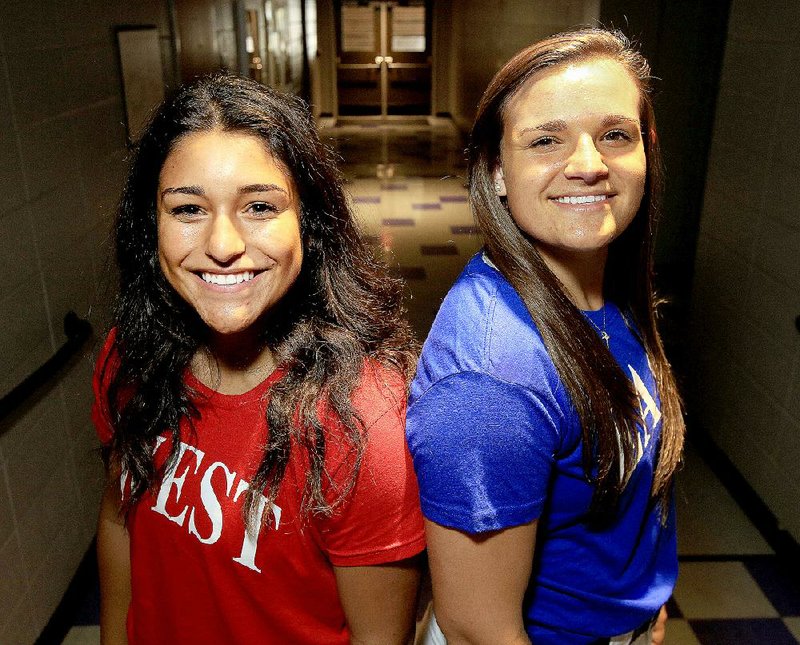 Paige Mendoza (left) of Fort Smith Southside and Megan Goodknight of Cabot combined for 16 home runs as seniors and are expected to provide plenty of power in today’s high school all-star softball game.