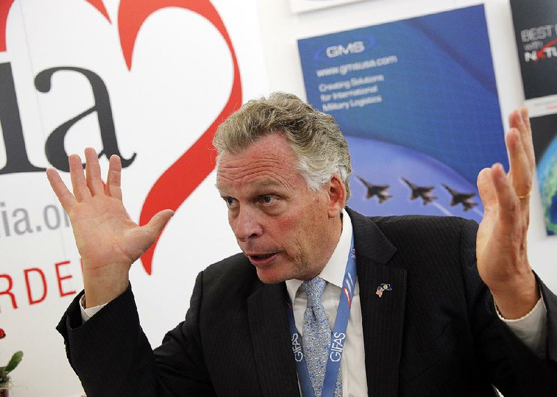 Virginia Gov. Terry McAuliffe speaks during an interview last week with the Associated Press at the Paris Air Show at Le Bourget airport, north of Paris.