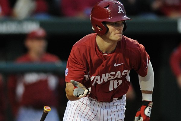 Andrew Benintendi of Arkansas heads to down the line against of Mississippi State during the third inning Friday, April 24, 2015, at Baum Stadium in Fayetteville.