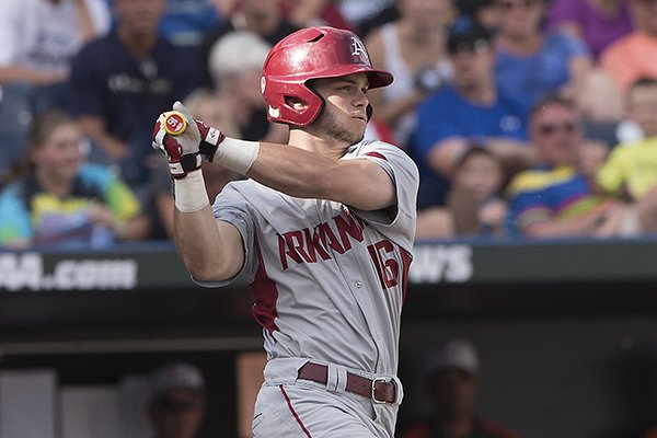 Arkansas outfielder Andrew Benintendi bats during a College World Series game against Miami on Monday, June 15, 2015, at TD Ameritrade Park in Omaha, Neb. 