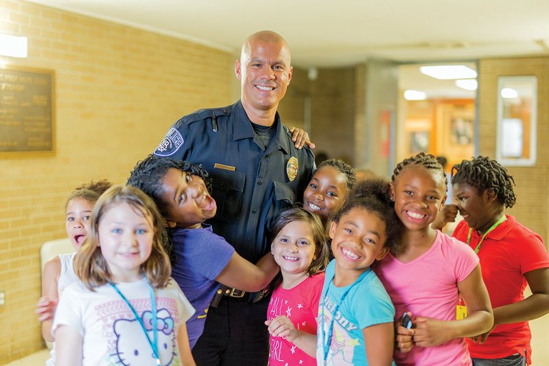 Norman routinely visits with children at the Wetherington Boys and Girls Club in North Little Rock.