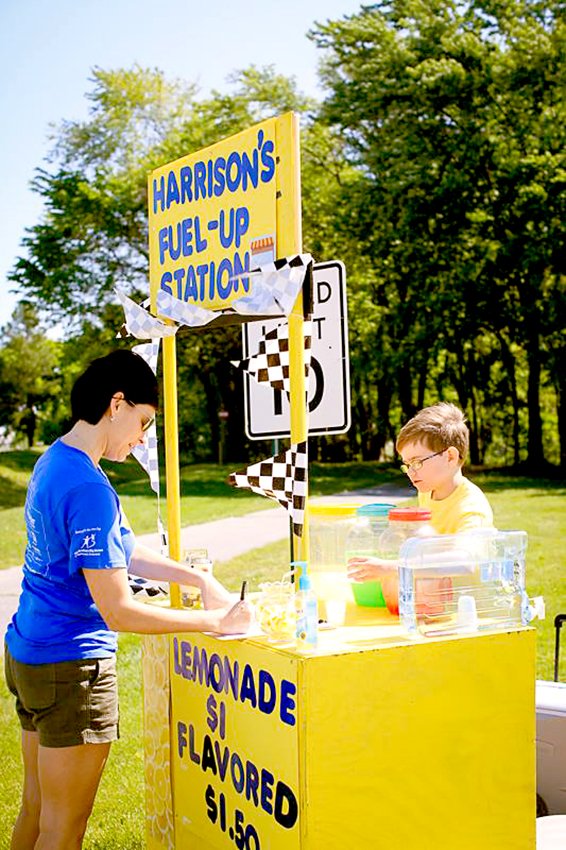 Courtesy of Feyerabend Photoartists Harrison Harp of Siloam Springs won the Sam Walton &#8220;Go For It&#8221; award for having the top lemonade stand in Northwest Arkansas on Lemonade Day on May 2. His stand was set up at La-Z-Boy ball park. Lemonade Day was an event of Big Brothers, Big Sisters of Northwest Arkansas.