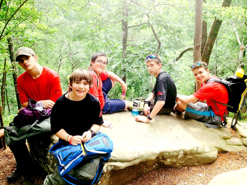 Courtesy of Boy Scouts of America Troop 3766 Boy Scouts of Troop 3766 take a snack break while hiking Whitaker Point Trail.