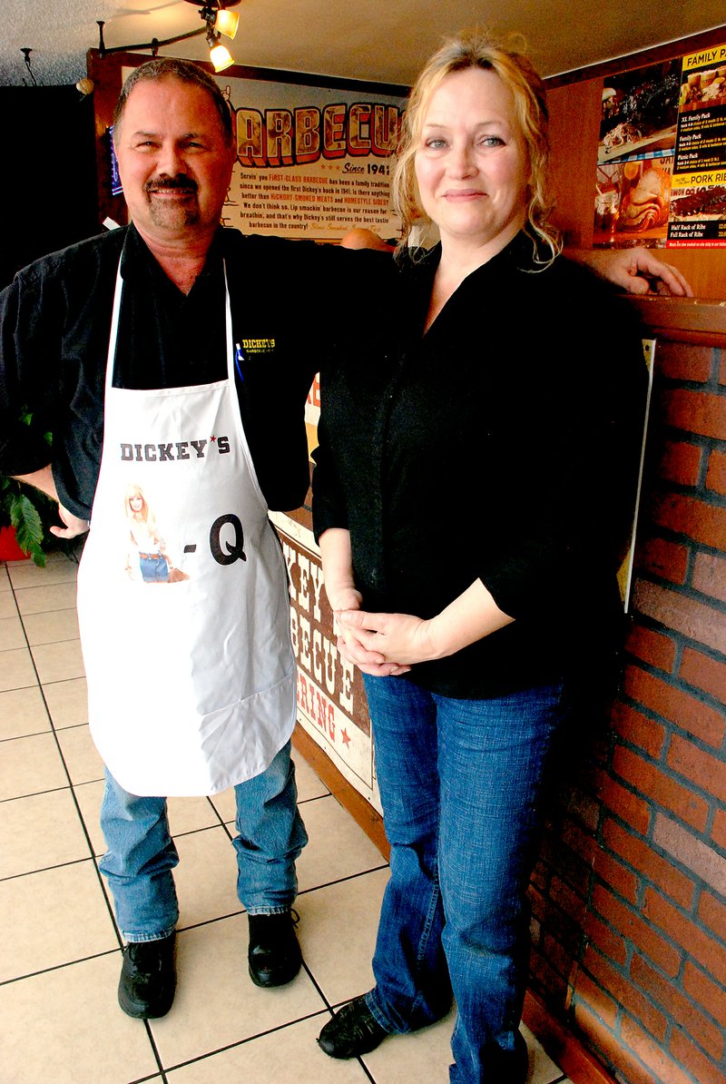 Jeff Della Rosa/Special to the Herald-Leader Terry and Marsha Tracy have owned Dickey&#8217;s Barbecue Pit for more than two years. They&#8217;ve worked hard to turn the restaurant into a profitable business.
