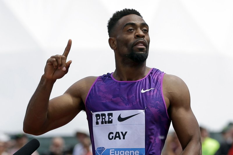 In this May 30, 2015, file photo, sprinter Tyson Gay celebrates after winning the men's 100-meter race at the Prefontaine Classic track and field meet in Eugene, Ore. 