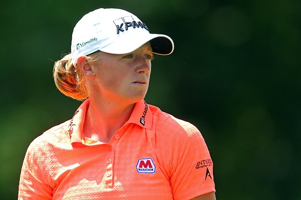 Stacy Lewis watches her tee shot on the 13th hole during the second round of the KPMG Women's PGA golf championship at Westchester Country Club, Friday, June 12, 2015, in Harrison, N.Y. (AP Photo/Adam Hunger)