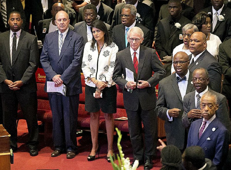 Charleston County Sheriff Al Cannon (second from left), Gov. Nikki Haley and Charleston Mayor Joseph Riley attend the funeral service Thursday for Ethel Lance at Emanuel AME Church in North Charleston, S.C. 