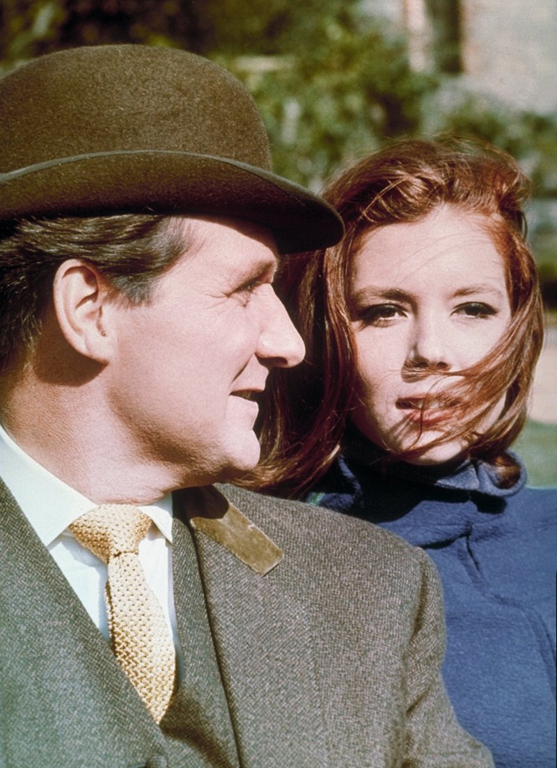 This 1966 photo provided by ABC shows, Patrick Macnee, left, as John Steed, and Diana Rigg as Emma Peel, British secret agents in a scene from "The Avengers." Macnee, the British-born actor best known as the dapper secret agent John Steed in the long-running 1960s TV series has died.