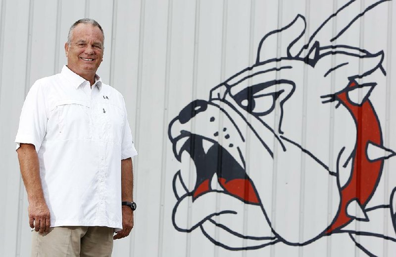 Rick Jones, head football coach at Greenwood High School, outside the football facility on the campus of the Greenwood School District Tuesday, June 16, 2015. Jones has lead his teams to six state championship wins and was 2012 Football Coach of the Year by the National Federation of State High School Associations. 