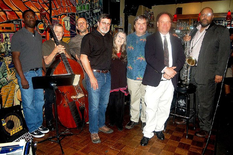 Pictured are drummer Bryan Withers; upright bassist Bill Huntington; pianist Chris Porter; bassist and 2014 Hall of Fame inductee Joe Vick; foundation secretary Alita Mantels; 1994 Hall of Fame inductee Buck Powell; foundation president James Thomson; and tenor saxophonist John Bush.
