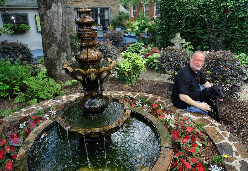 Jim Maase poses in his favorite spot -- his backyard.