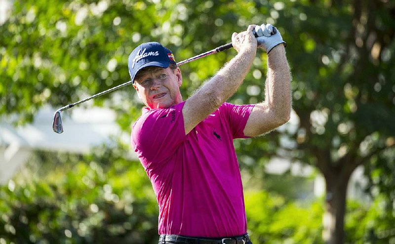 In this photo provided by the United States Golf Association, Tom Watson watches his tee shot on the 10th hole during the first round round of the 2015 U.S. Senior Open golf tournament at Del Paso Country Club in Sacramento, Calif., Thursday, June 25, 2015. 