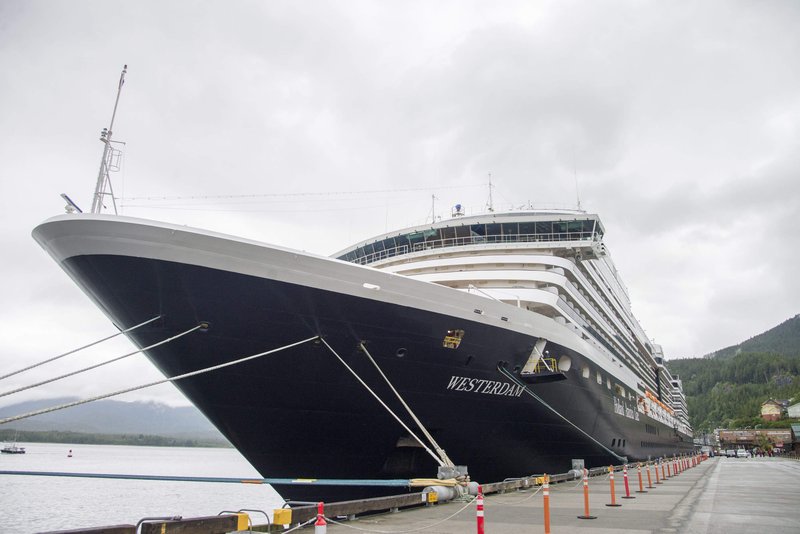 The Holland America Line cruise ship Westerdam sits in dock in Ketchikan, Alaska, on Thursday, June 25, 2015. Officials say eight passengers on an excursion off the ship and a pilot were in plane that was found crashed against the granite rock face of a cliff about 20 miles northeast of Ketchikan, Alaska. 