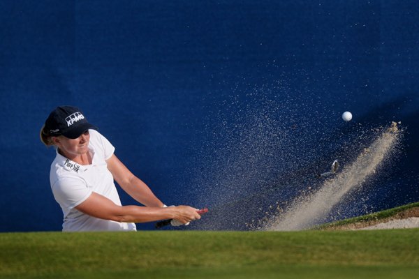 Stacy Lewis chips from a bunker on the 18th green on Sunday, June 28, 2015, during the final round of the Walmart NW Arkansas Championship at Pinnacle Country Club in Rogers. Lewis had a bogie on No. 18.