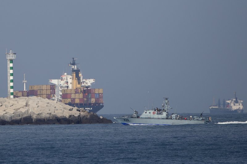 Checking goods: An Israeli naval battle ship sails in the Mediterranean sea back to Ashdod port in Israel on Monday. Israels navy intercepted a vessel attempting to breach a naval blockade of Gaza early Monday and was redirecting it to an Israeli port, the military and the activists said. 
